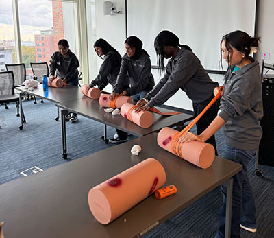 People participating in 'Stop the Bleed' training