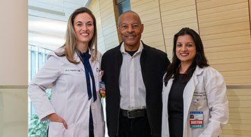 Donald Barge with surgical oncologist Dr. Elise Bianchi (left) and medical oncologist Dr. Shikha Jain (right).