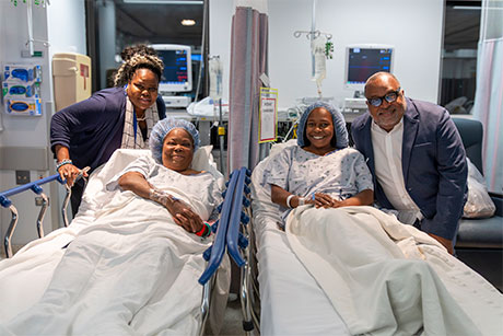 Olivia with her mother Monica and family